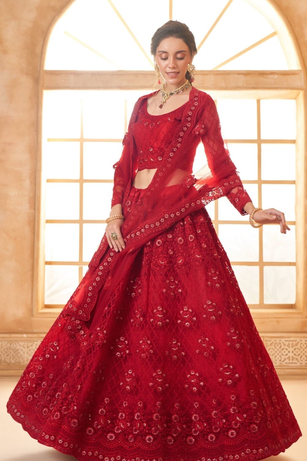 Red Heavy Thread Embroidered Net Bridal Lehenga Choli