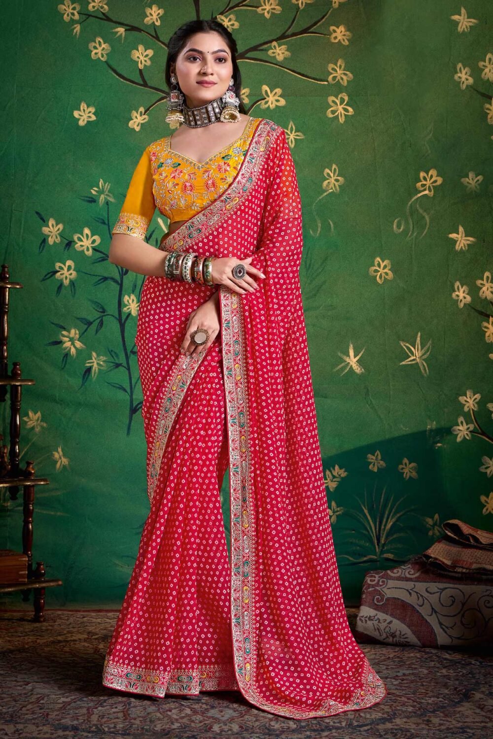 Pink Bandhni Print Georgette Women Saree With Embroidered Yellow Blouse