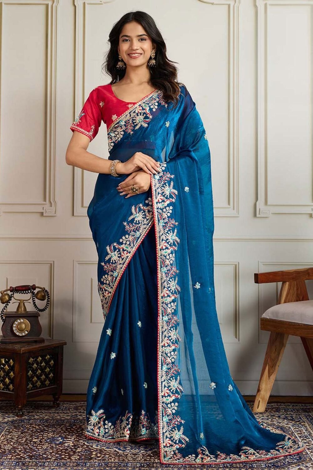 Blue Georgette Saree With Embroidered Art Silk Red Blouse For Women